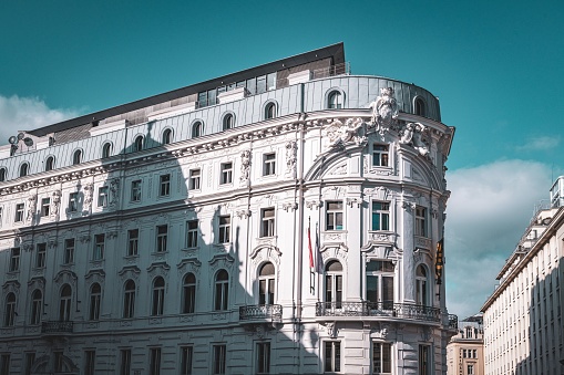 A vibrant and pleasing view of Palais Herberstein in Vienna, Austria, illuminated by the warm sunlight