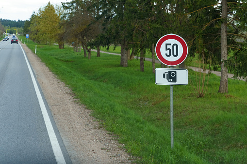 Road sign maximum speed limit 50, fixing speed by camera.