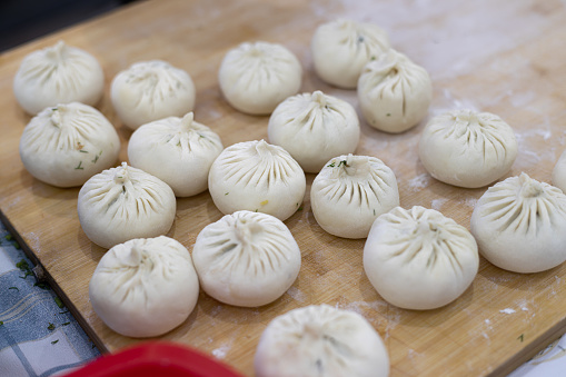 Hand making Chinese baozi