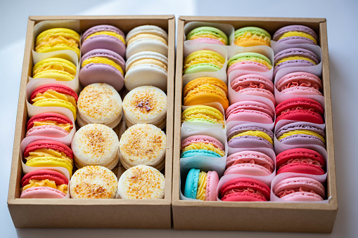 Homemade macarons Set of different multi-colored macaroon cookies. colorful almond cookies, french sweet delicacy. Sweet macarons in gift box.