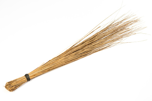 Besom or broom isolated on white background