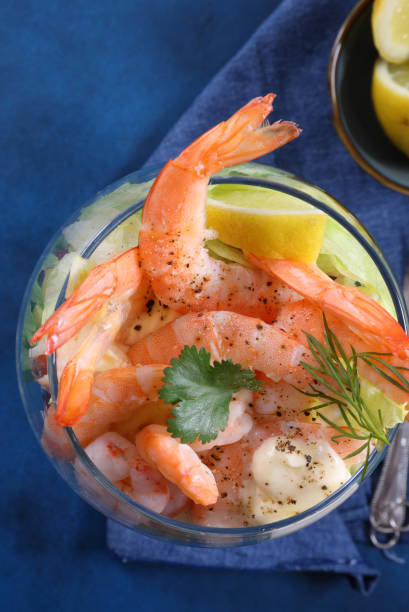 istock Prawn Cocktail on blue background 1732931690