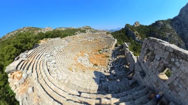 Theatre of Mount Gulluk-Termessos of Turkey Aerial view of the ancient theater in Mount Gulluk-Termessos National Park, Turkey, is a breathtaking archaeological marvel set amidst the rugged beauty of nature. termessos stock pictures, royalty-free photos & images