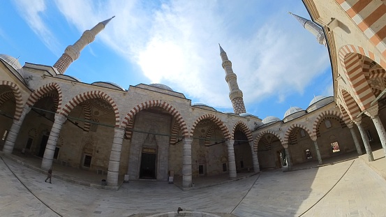 Edirne, Turkey - Aug 9,2023:UC Serefeli Mosque spacious courtyard, elegant prayer halls provide serene atmosphere for worshippers and tourists.Edirne's rich cultural heritage and architectural prowess