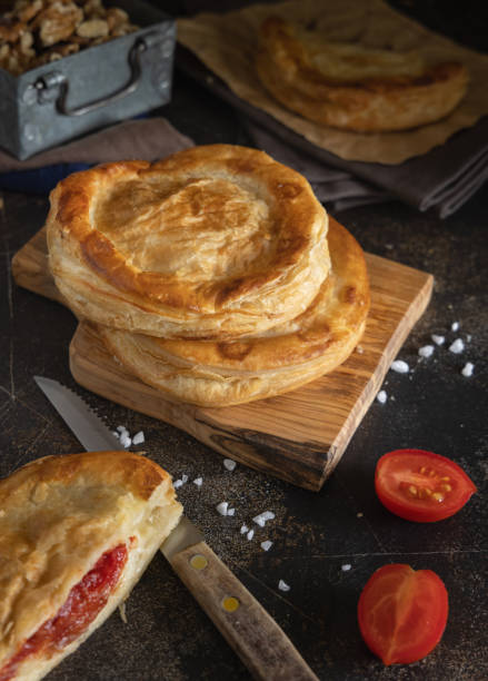 istock Rustico puff pastry from Lecce filled with stuffed with tomato, mozzarella and bechamel sauce 1733029163