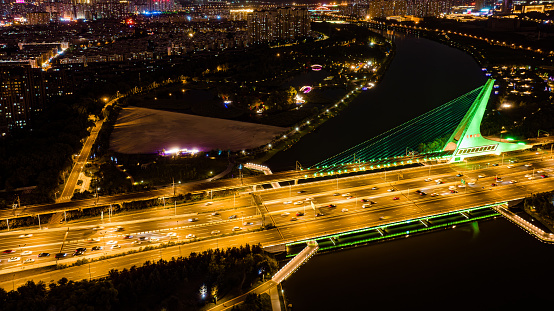 On September 3, 2023, in Changchun, China, the night view of the Changchun Satellite Bridge during the summer.