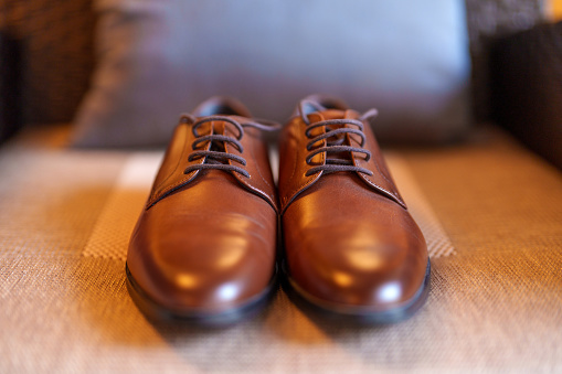 Elegant brown leather men's shoes in a close-up