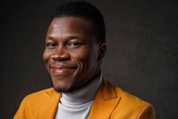 istock Stylish dark-skinned man wearing a yellow blazer 1733126053