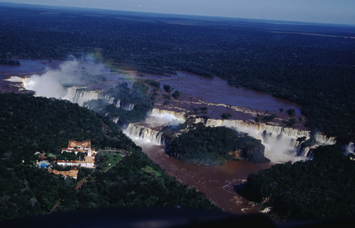 The Iguazu Falls are the largest waterfall system in the world. Stretching almost 3km along the border of Argentina and Brazil, the falls are made up of roughly 275 different vertical drops, with heights varying from 60 meters - 82 meters. This makes the Iguazu Falls taller than Niagara Falls and twice as wide.