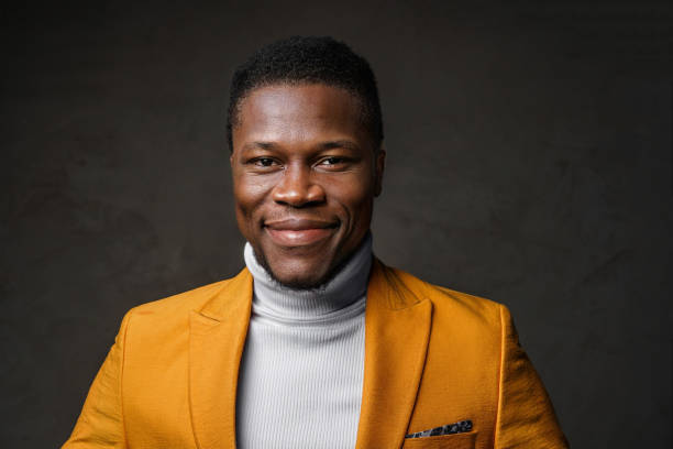 istock Stylish dark-skinned man wearing a yellow blazer 1733132265