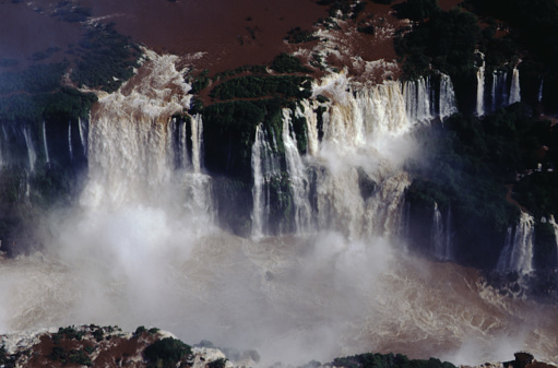 The Iguazu Falls are the largest waterfall system in the world. Stretching almost 3km along the border of Argentina and Brazil, the falls are made up of roughly 275 different vertical drops, with heights varying from 60 meters - 82 meters. This makes the Iguazu Falls taller than Niagara Falls and twice as wide.