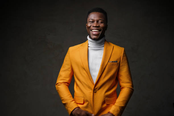 istock Stylish dark-skinned man wearing a yellow blazer 1733133380