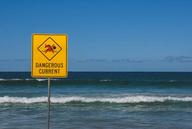 istock Warning sign for swimmers to beware dangerous currents, Manly Beach, Sydney 1733141797