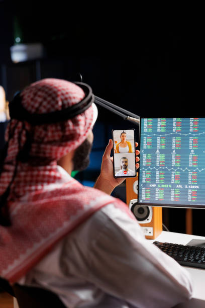 istock Muslim man engrossed in a video call 1733164724