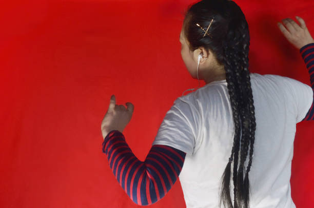 Woman Dancing to the Music/ Studio Shot