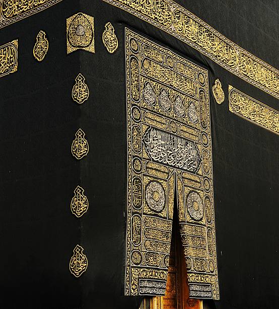 Makkah Kaaba Door with verses from the Koran in gold stock photo