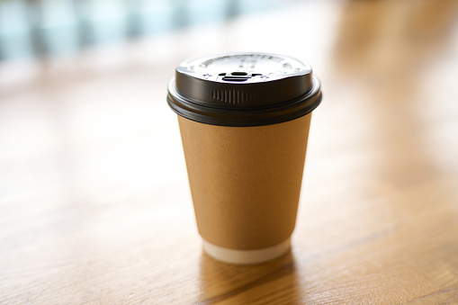 hot coffee in a paper cup