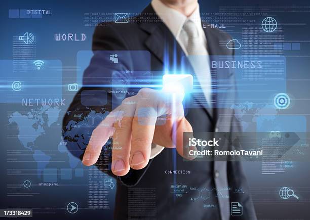 Man Pressing A Multimedia Computer Display Stock Photo - Download Image Now - Abstract, Data, Downloading