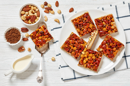 istock toffee mixed nuts shortbread bars on white plate 1733192447