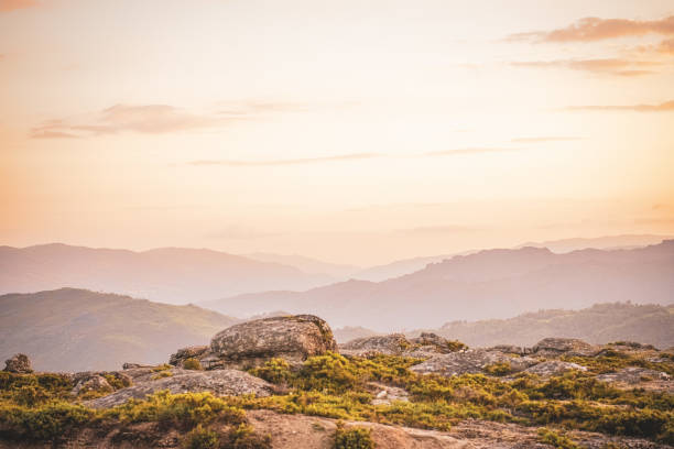 Free Stock Photo of Dramatic sunset over mountains with rolling green ...