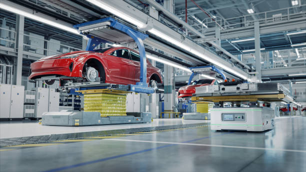 istock EV Production Line on Advanced Automated Smart Factory. High Performance Electric Car Manufacturing. Car Batteries Installation to Electric Vehicles on Assembly line. AGV Transport Batteries. 1733213112