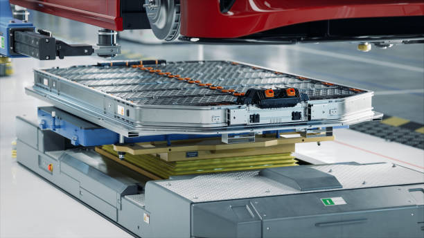 istock Generic EV Battery Pack under Electric Car on Production Line inside Modern Factory. High Capacity Battery for Automotive Industry. Lithium-ion High-voltage Battery for Electric Vehicle or Hybrid Car 1733213132