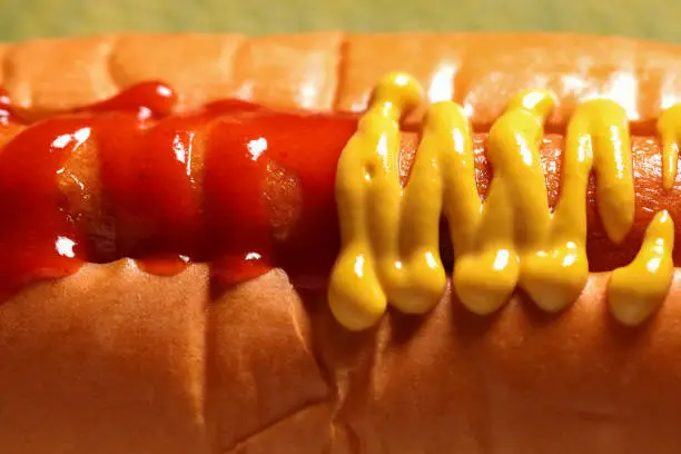 Photo of BBQ hot dogs with yellow mustard and red sweet chili sauce, Mastercard Creative,