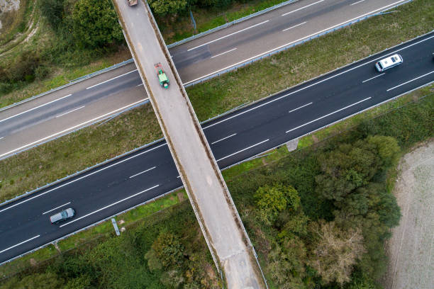 istock drone aerial view of an overpass over a highway 1733252516