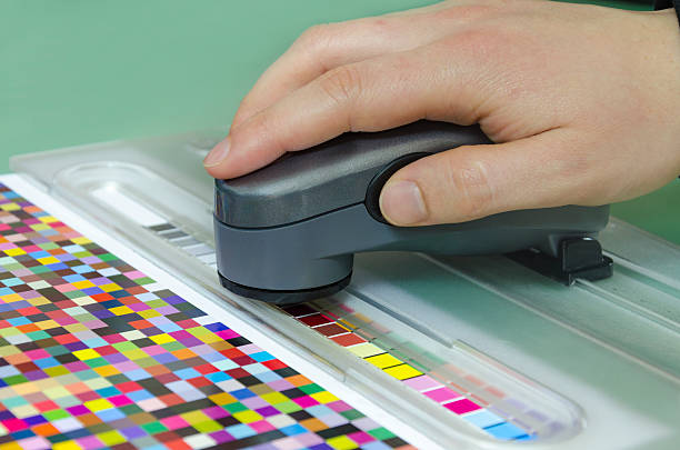 istock icc profiling, spectrophotometer robot measures color patches on Test Arch 173326925