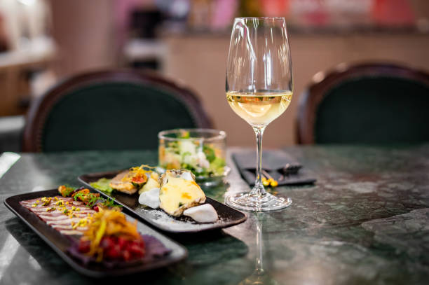 istock tasting set appetizer food and white wine glass 1733297350
