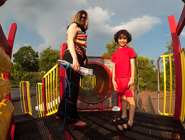 istock Single mother and her child in a park 173329744