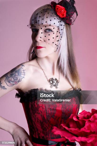 Semiprofile Of Woman In Lace Corset On Pink Stock Photo - Download Image Now - 20-29 Years, 25-29 Years, Adult