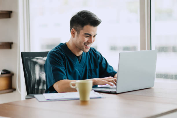 istock Young Asian Filipino doctor busy at work. 1733323663