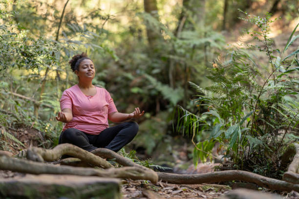 istock Woman relaxing in the forest 1733329430