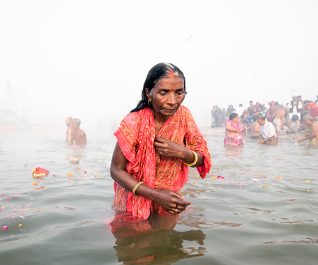 Hallahabad. India- january 17 2019: The Prayag Kumbh Mela, also known as Allahabad Kumbh Mela is a mela, or religious gathering, associated with Hinduism and held in the city of Prayagraj, India, at the Triveni Sangam, the confluence of the Ganges, the Yamuna, and the mythical Sarasvati river.[1] The festival is marked by a ritual dip in the waters, but it is also a celebration of community commerce with numerous fairs, education, religious discourses by saints, mass feedings of monks or the poor, and entertainment spectacle.[2][3] Approximately 50 and 30 million people attended the Allahabad Ardh Kumbh Mela in 2019 and Maha Kumbh Mela in 2013 respectively to bathe in the holy river Ganges, making them the largest peaceful gathering events in the world.[4][5]