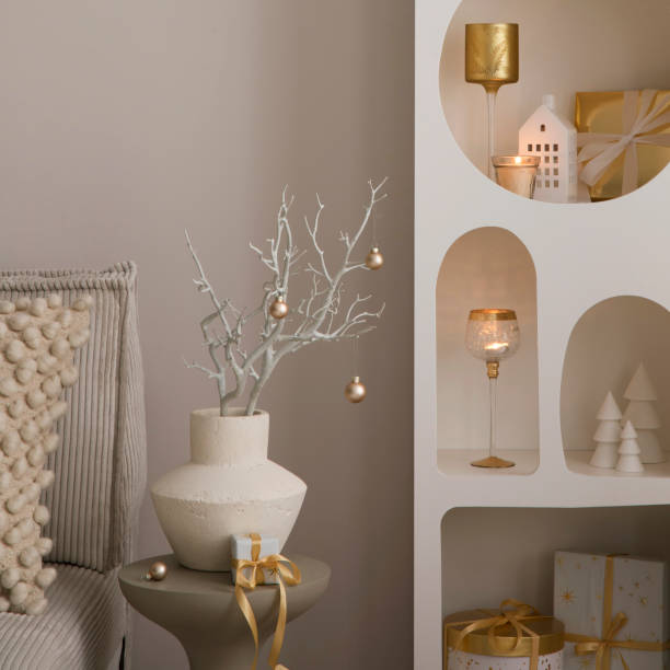 istock Beautiful composition on white design shelf with christmas decoration, lights, gifts, lanterns ,deer, candles, stars and accessories. Mock up poster frame. Santa claus is coming. Template. 1733379896