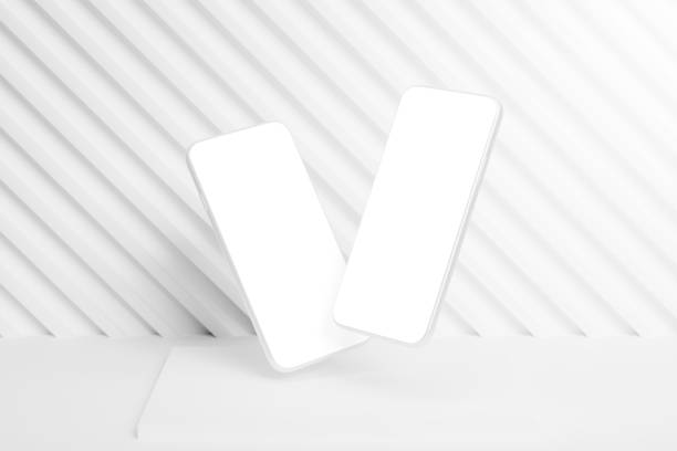 istock Two smartphones with blank screens on white background 1733400343