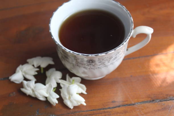 istock a cup of tea with jasmine flowers 1733425840