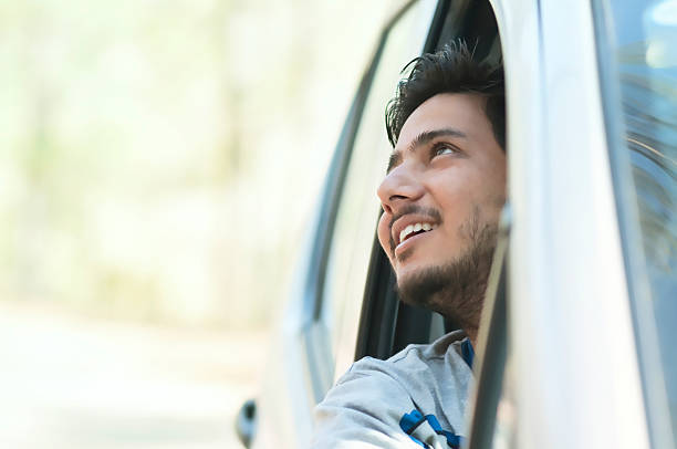 istock Happy young man in a Car 173342922