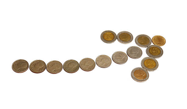 istock Coins in the up arrow shape isolated on white 173343097