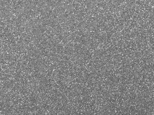 istock SILVER GREY GLITTER sparkling background with bright reflections and small lights 1733489139