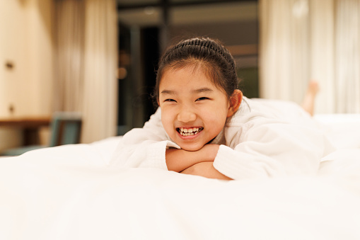 Little Girl Resting at the Hotel