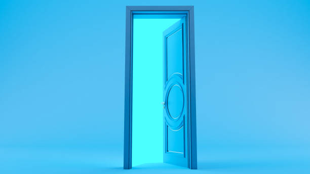 istock blue door Open entrance in colored background room. 1733515217