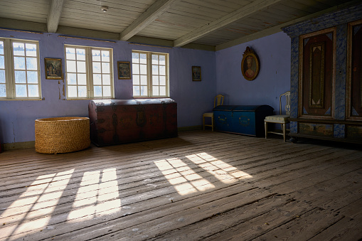 The village is a collection of buildings from the 19th century moved brick by brick from the original location to the museum.  This is a living room from a farm.