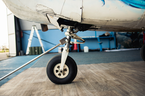 Part of a jet plane in the hangar at the airport, ready for the repair