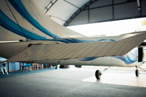 Jet plane in the hangar at the airport, ready for the repair