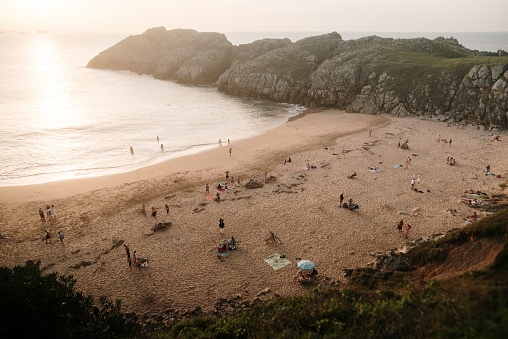 A beautiful beach with sunset light. Somocuevas beach in Liencres, Cantabria, Spain