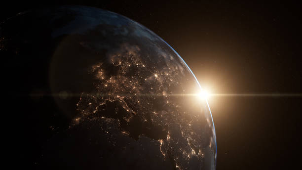 Planet Earth - Sunrise Over Europe - Sun, Space, Clouds, Electricity, Sustainable Resources 3D rendered image of planet earth, including volumetric clouds illuminated by city lights. Created with textures by NASA: https://visibleearth.nasa.gov/images/55167/earths-city-lights, https://visibleearth.nasa.gov/images/73934/topography, https://visibleearth.nasa.gov/images/57747/blue-marble-clouds/77558l origins stock pictures, royalty-free photos & images