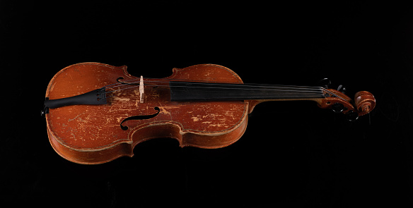 Violin on black background