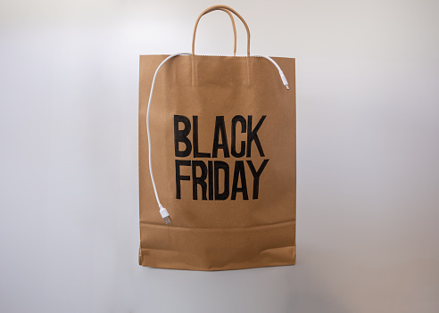 Black friday shopping bag isolated with black and red colors  and with mock up space for writing